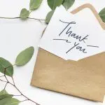 A Thousand Thanks: Why practising gratitude increases your happiness. Image of Thank You card in an envelope