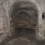 Happy Travels: Where you absolutely should go in Malta. Image of inside the Catacombs in Rabat Malta