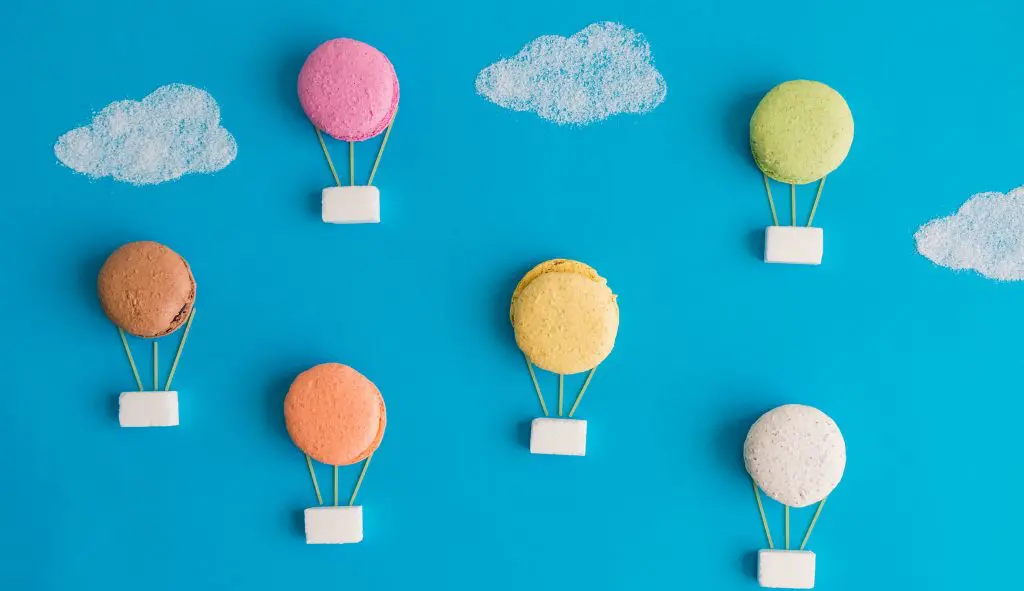 Concept of sweet food as hot air balloon lifting up freely into the sky - indicating food freedom