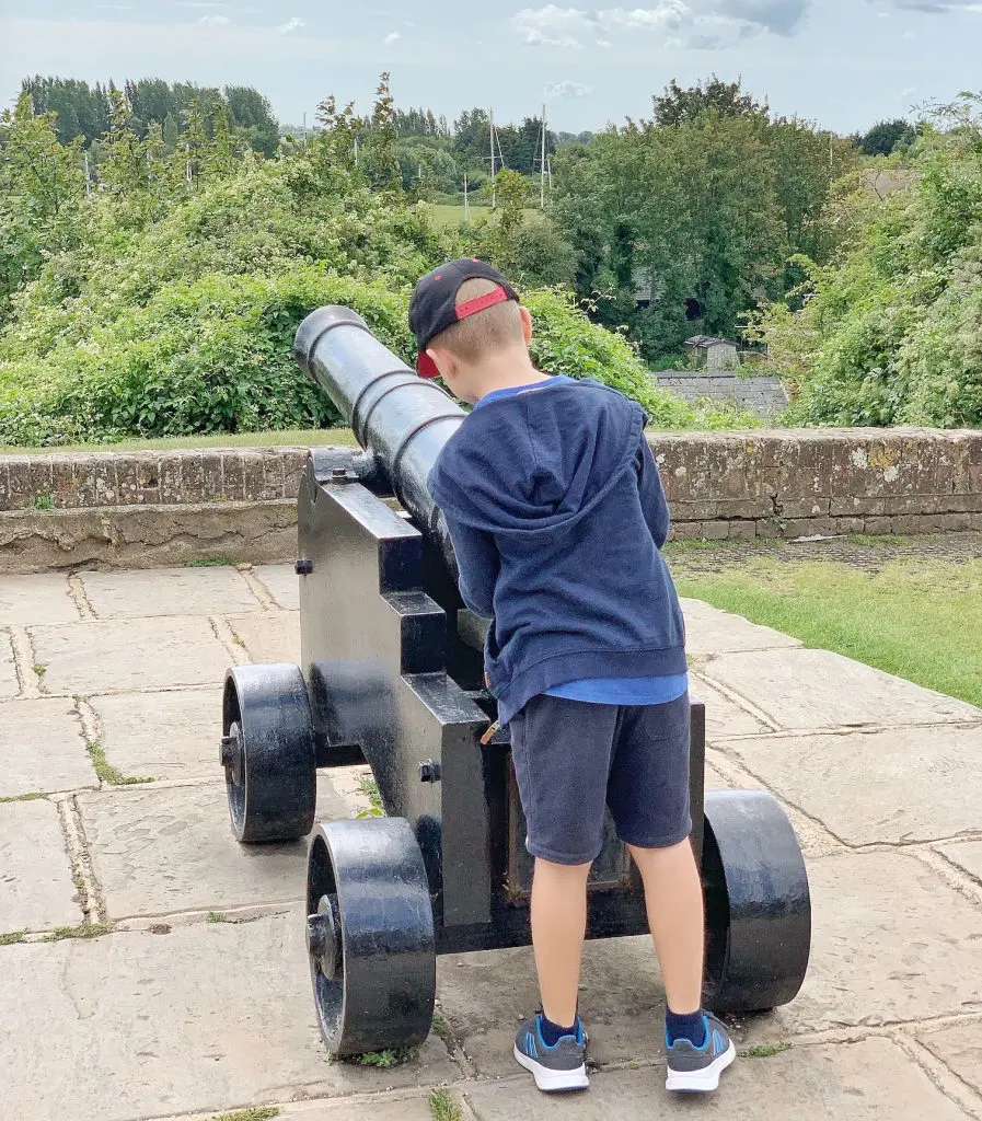 Stopping to admire the cannons whilst in Rye with kids