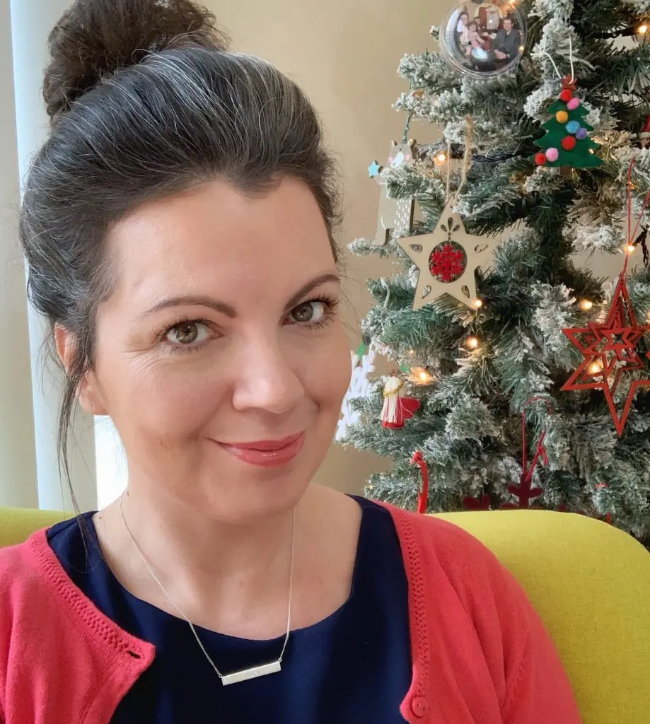 Alex Grace wearing a Trust Mantra Jewellery Necklace & shares how to choose a mantra