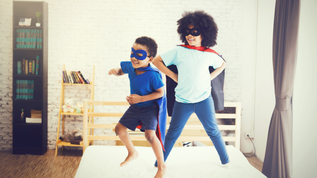 Happy & confident kids dressed as superheroes