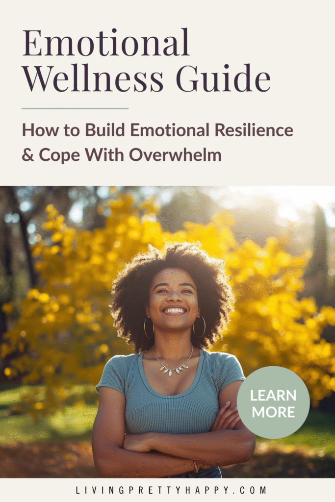 Emotional Wellness Guide How to Build Emotional Resilience and cope with overwhelm.  Woman standing outside on a sunny day with trees behind her and smiling whilst her arms are crossed