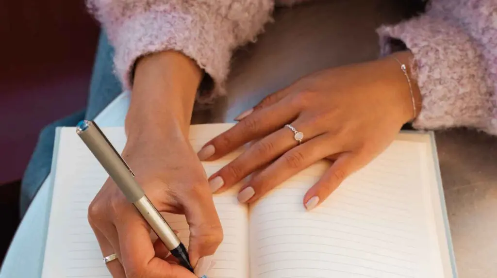 woman journalling to help clear her mind and boost focus