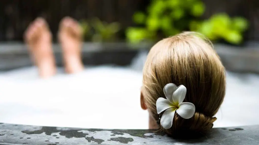 woman relaxing in her home spa