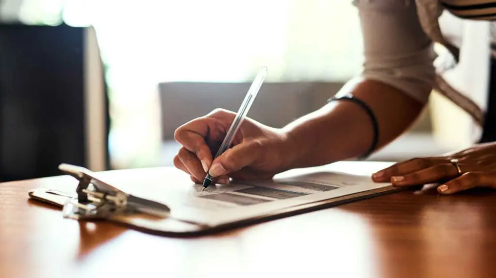 Concept of woman managing finance and legal issues as part of recovery process following a serious accident