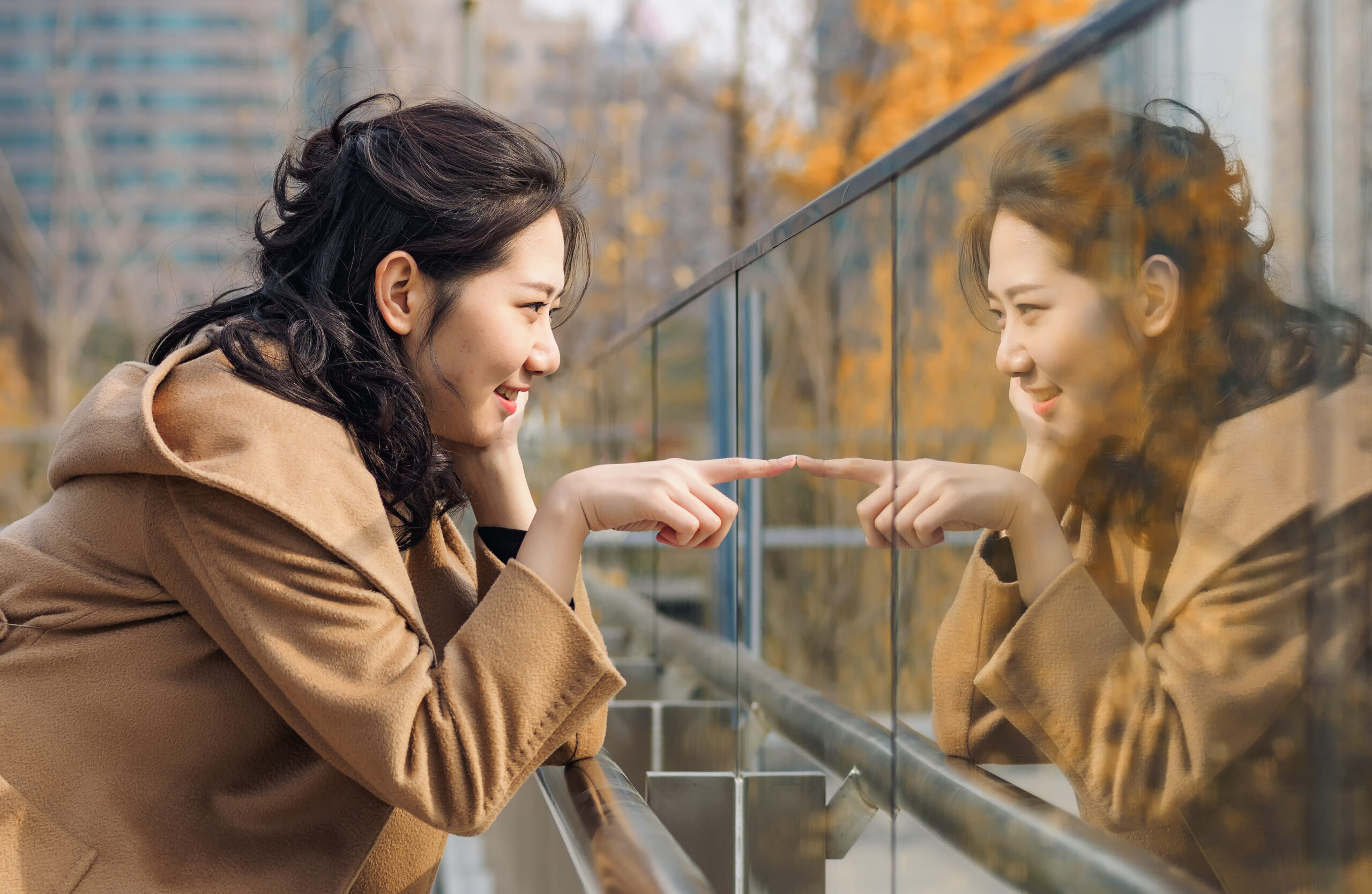 Self-awareness: a guest post by Simone Phillips. Image of woman looking at her reflection