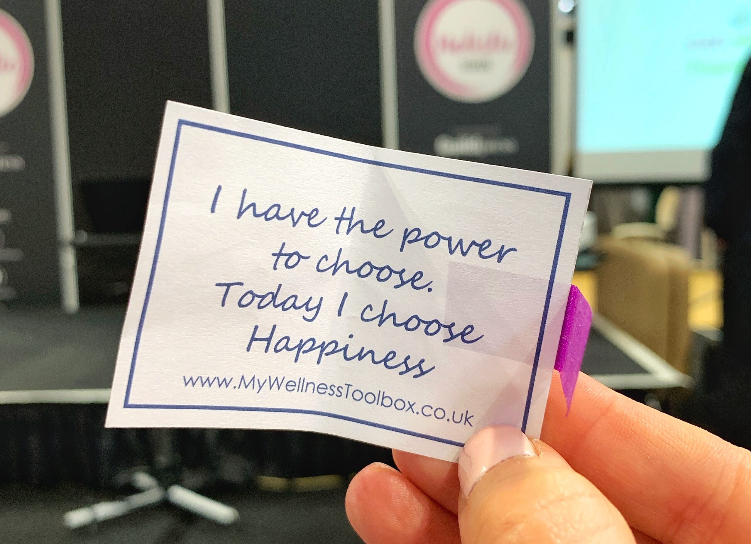 Paper affirmation reading 'I have the power to choose. Today I choose happiness. www.mywellnesstoolbox.co.uk