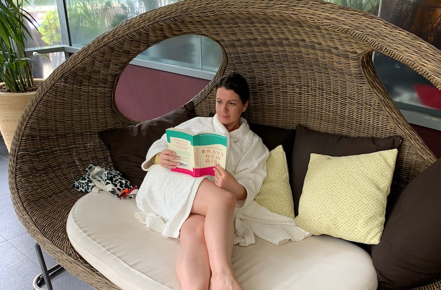 Alex Grace taking time out at the spa reading Brave New Girl by Chloe Brotheridge