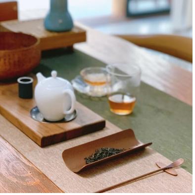 Prepare and observe the tea leaves as part of a mindful tea ritual